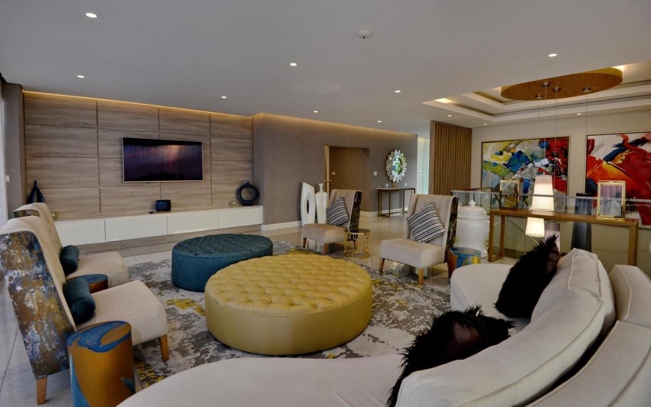 The Houghton Hotel, Spa, Wellness & Golf Johannesburg Exterior photo A living room in a luxury apartment