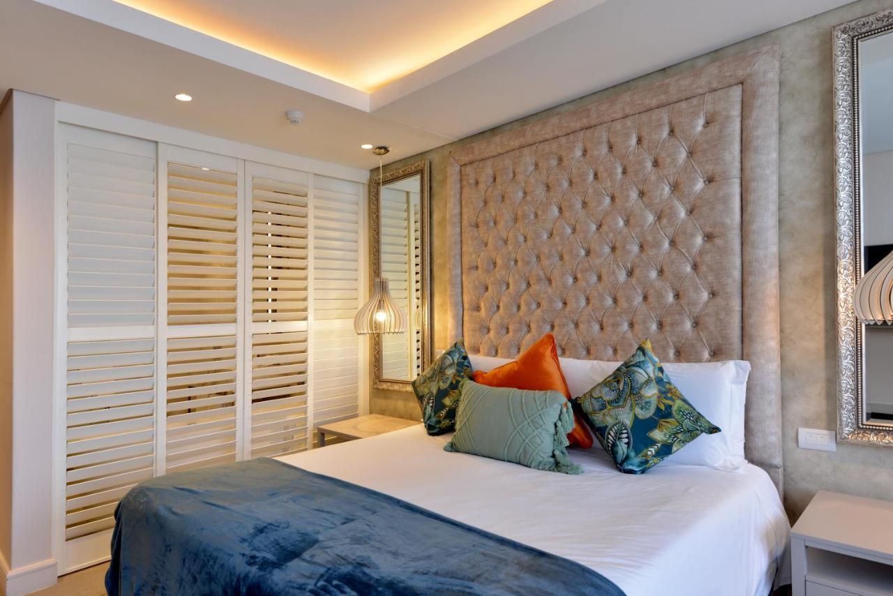 The Houghton Hotel, Spa, Wellness & Golf Johannesburg Exterior photo A bedroom at the Cape Heritage